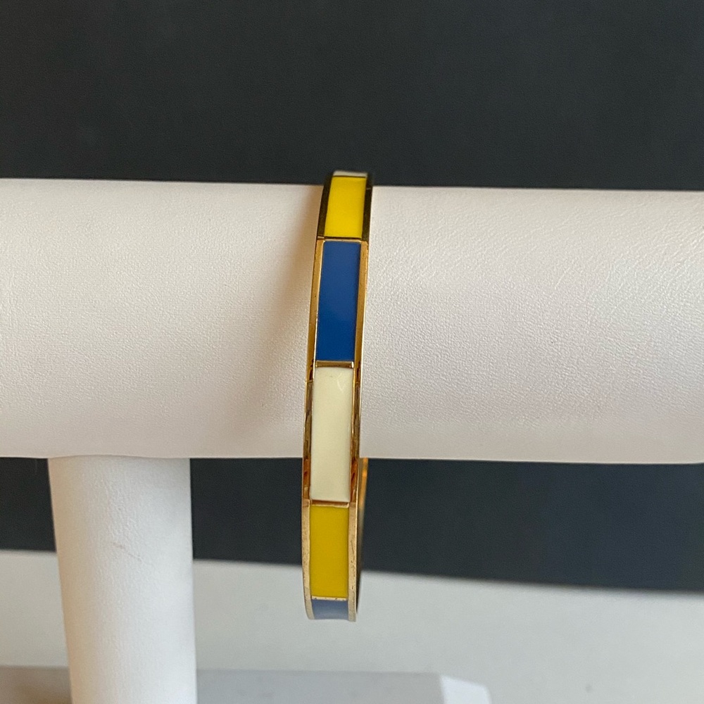 J Crew gold bracelet with blue, white and yellow
